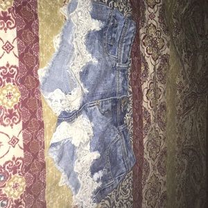 Jean short have white lase and Perl’s